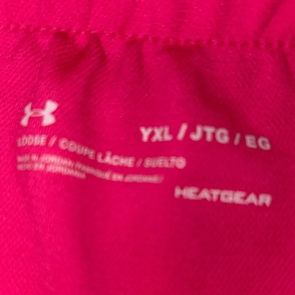 Under Armour Size YXL Bright Pink Athletic Shorts, Will Fit Women’s Small